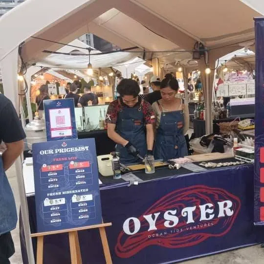 Ocean Tide Ventures oyster stall with the price list on display